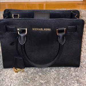 Small, black Michael Kors bag in great condition